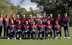Members of the 2016 United States Ryder Cup team pose for a group photo before a practice round for the Ryder Cup golf tournament Tuesday, Sept. 27, 2