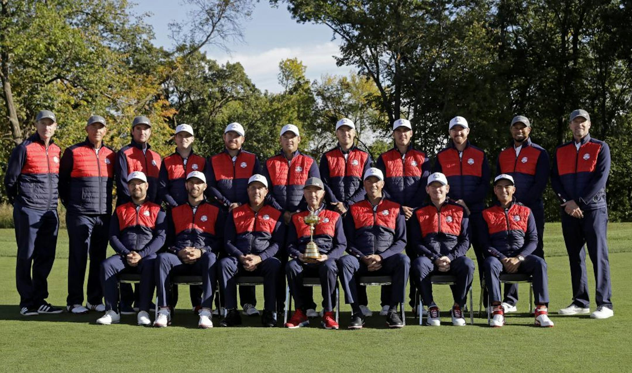 Members of the 2016 United States Ryder Cup team pose for a group photo before a practice round for the Ryder Cup golf tournament Tuesday, Sept. 27, 2016, at Hazeltine National Golf Club in Chaska, Minn.