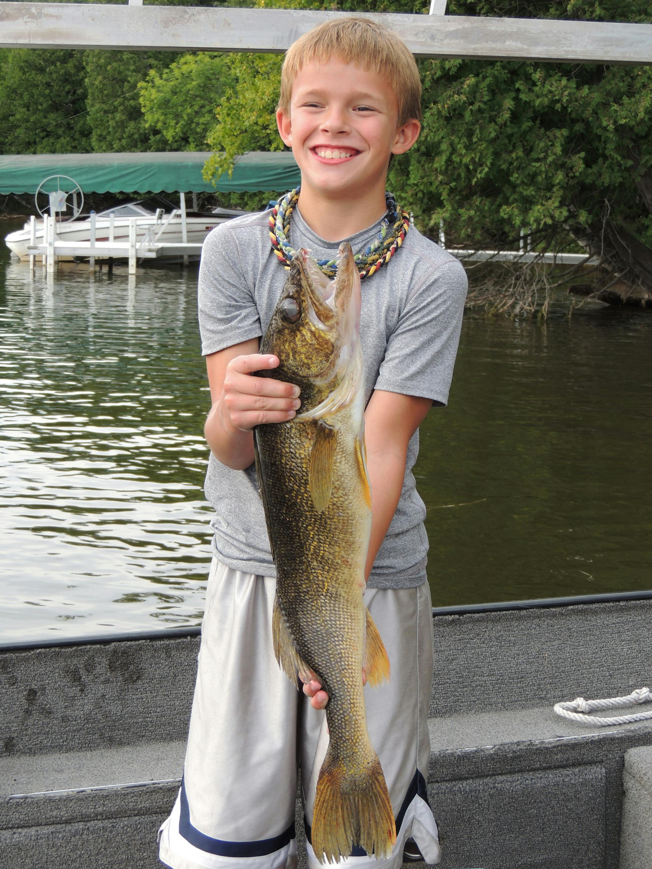 Ten-year-old Ethan Vanden Busch of Lakeville was fishing alone on the dock on Big Thunder Lake in Remer last summer when he hooked, reeled and netted this 29-inch walleye by himself. He caught it with a leech and bobber rig. ORG XMIT: MIN1208291340273684