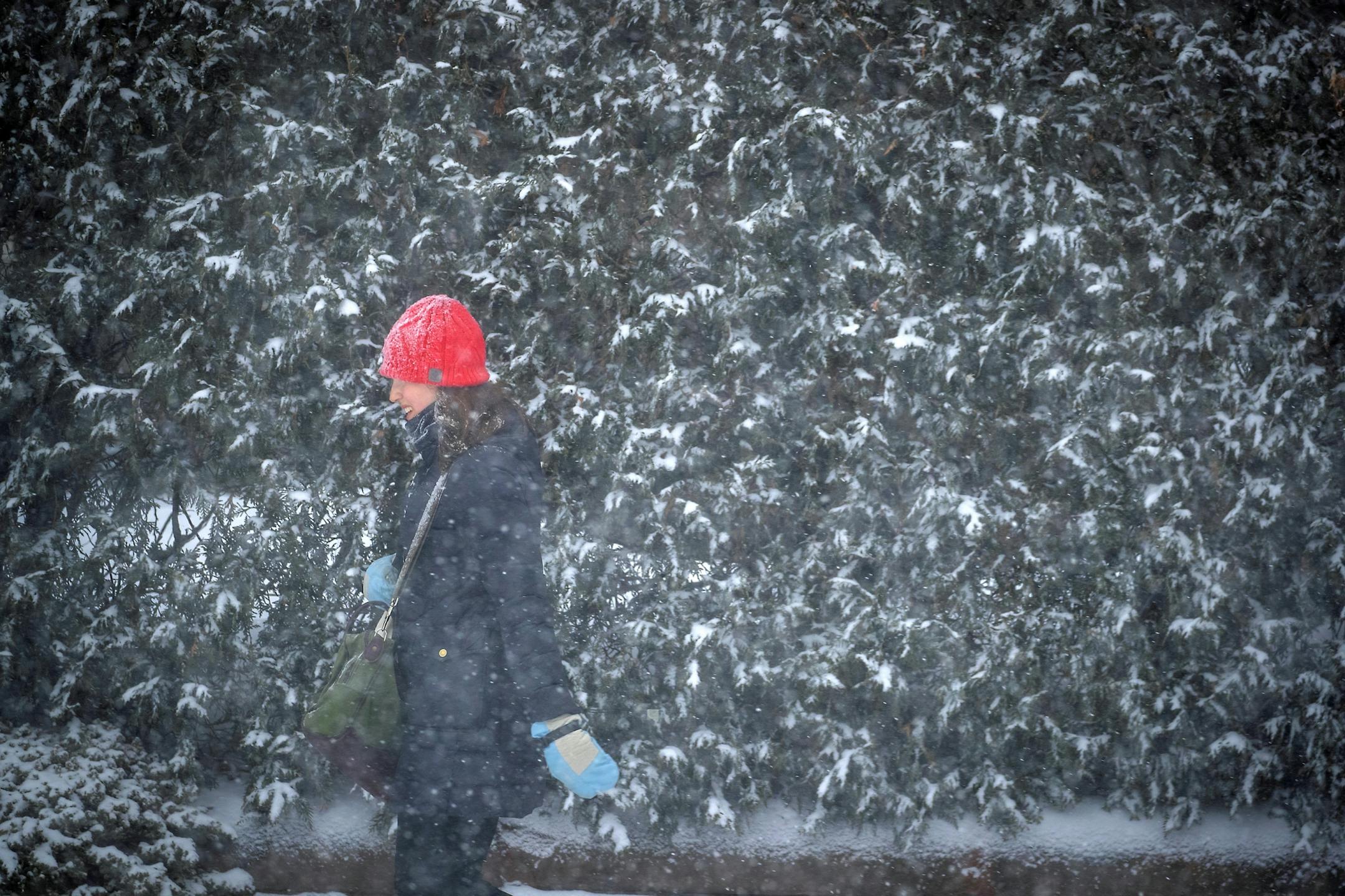 The morning commute either by car, bike or on foot was met with a snowy trek, Monday, December 9, 2019 in St. Paul, MN.