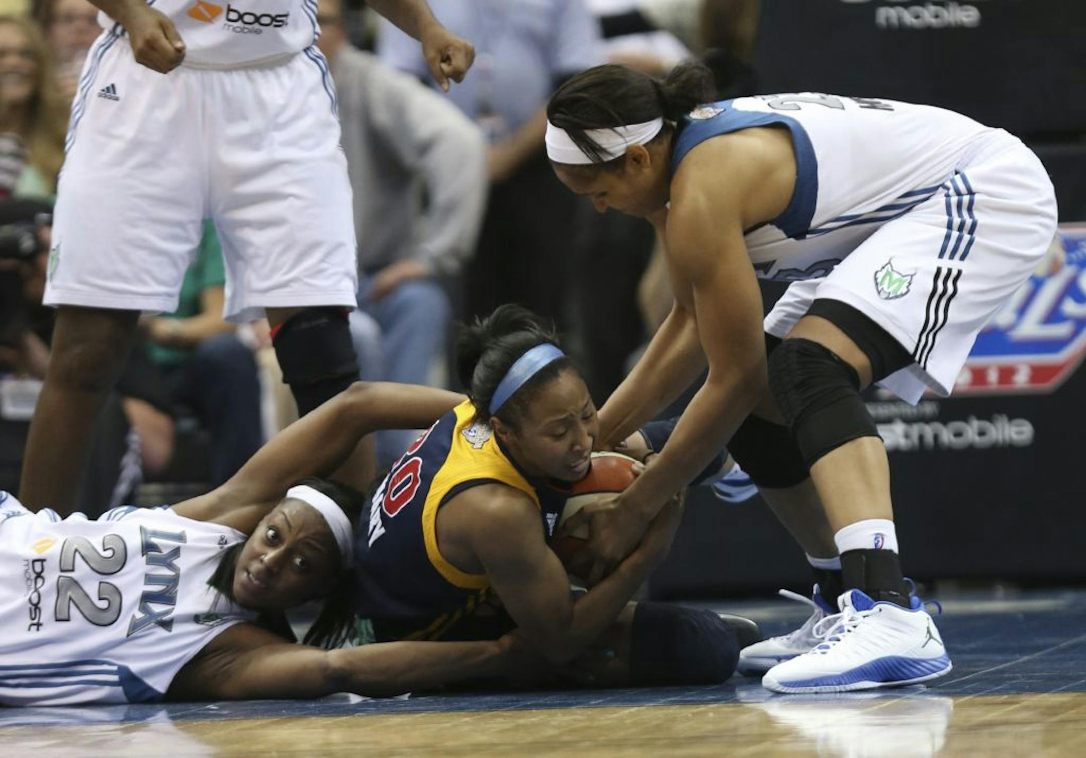 Monica Wright, hugging the floor and her opponent, had a big impact Wednesday with her defensive pressure against Indiana.