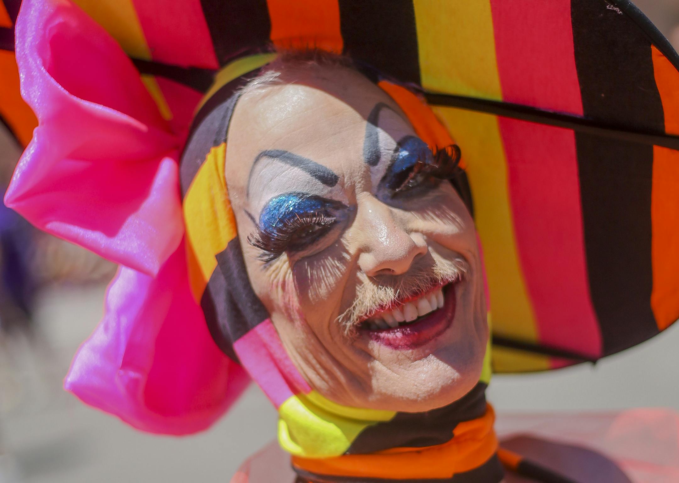 When asked how long it took to dress for the parade, Mark Sinclair laughed and replied, "Too long."