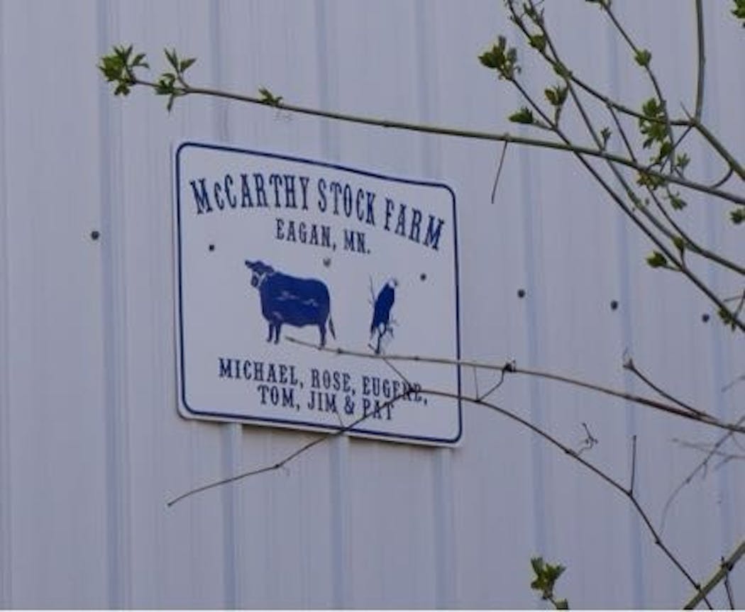 A sign on the McCarthy farm includes its location in Eagan.