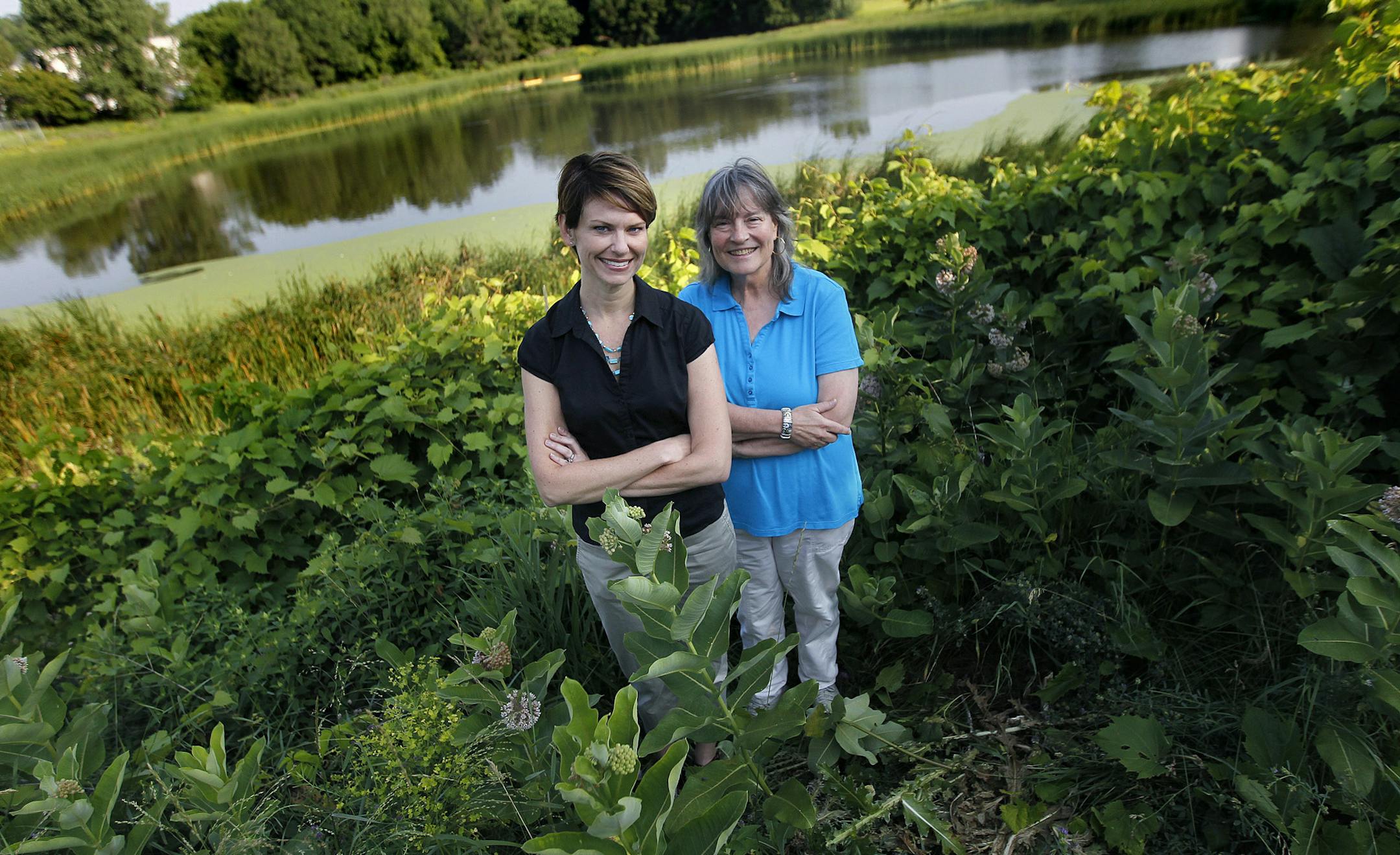 Project Manager Kathleen Anglo of the St. Paul Parks & Recreation Department, left, and Tri-Area Block Club Activist Linda Jungwirth, stood in the Trout Brook Nature Preserve, a $5 million project that broke ground last month, Wednesday, July 10, 2013 in St. Paul, MN. The City of St. Paul is creating a new nature preserve, bike trail & park along I-35E just north of downtown on land that since the late 19th century has been industrialized, including railroads & and a one-time steel fabrication o