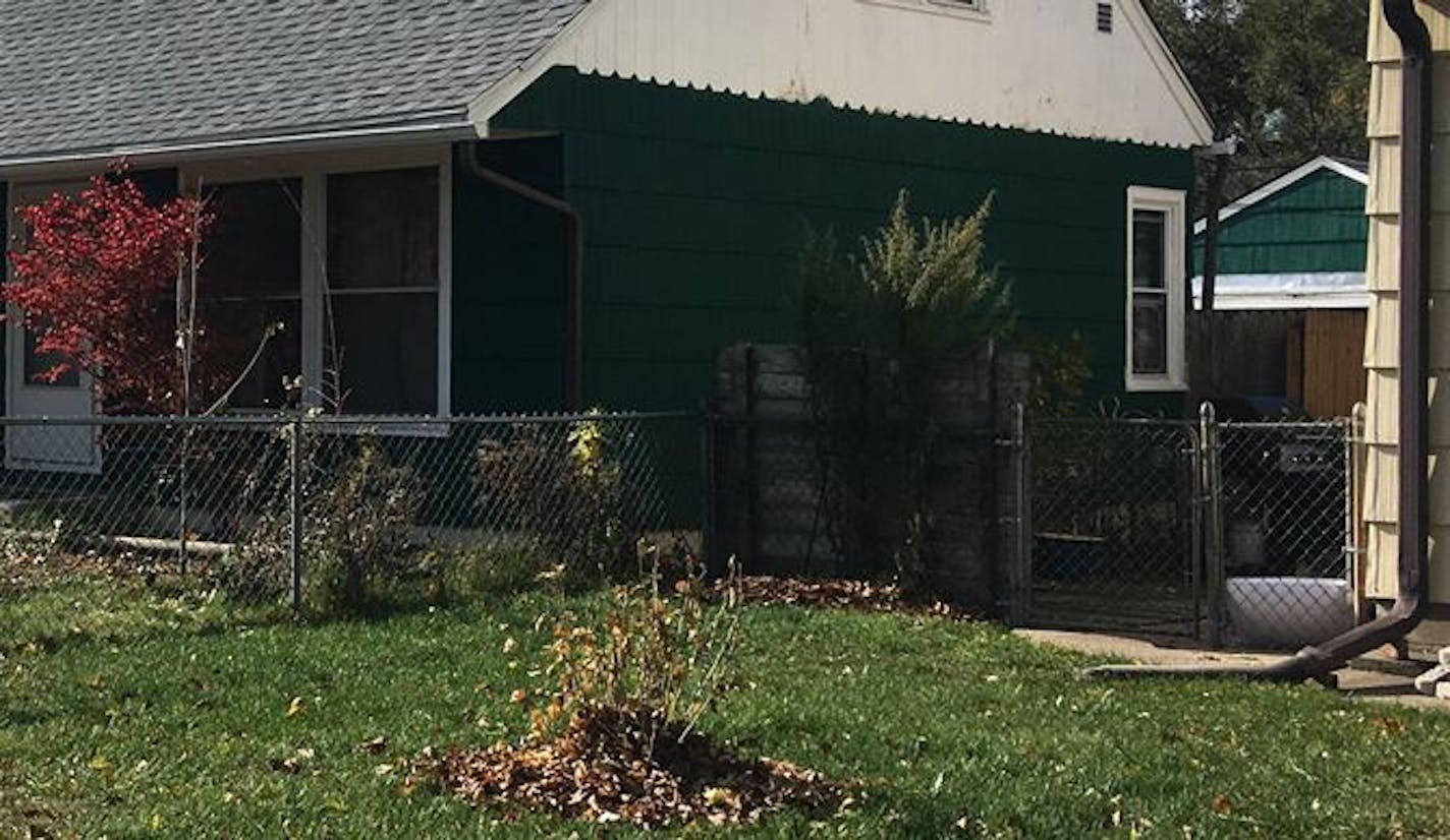 A man was found shot to death behind this north Minneapolis home.