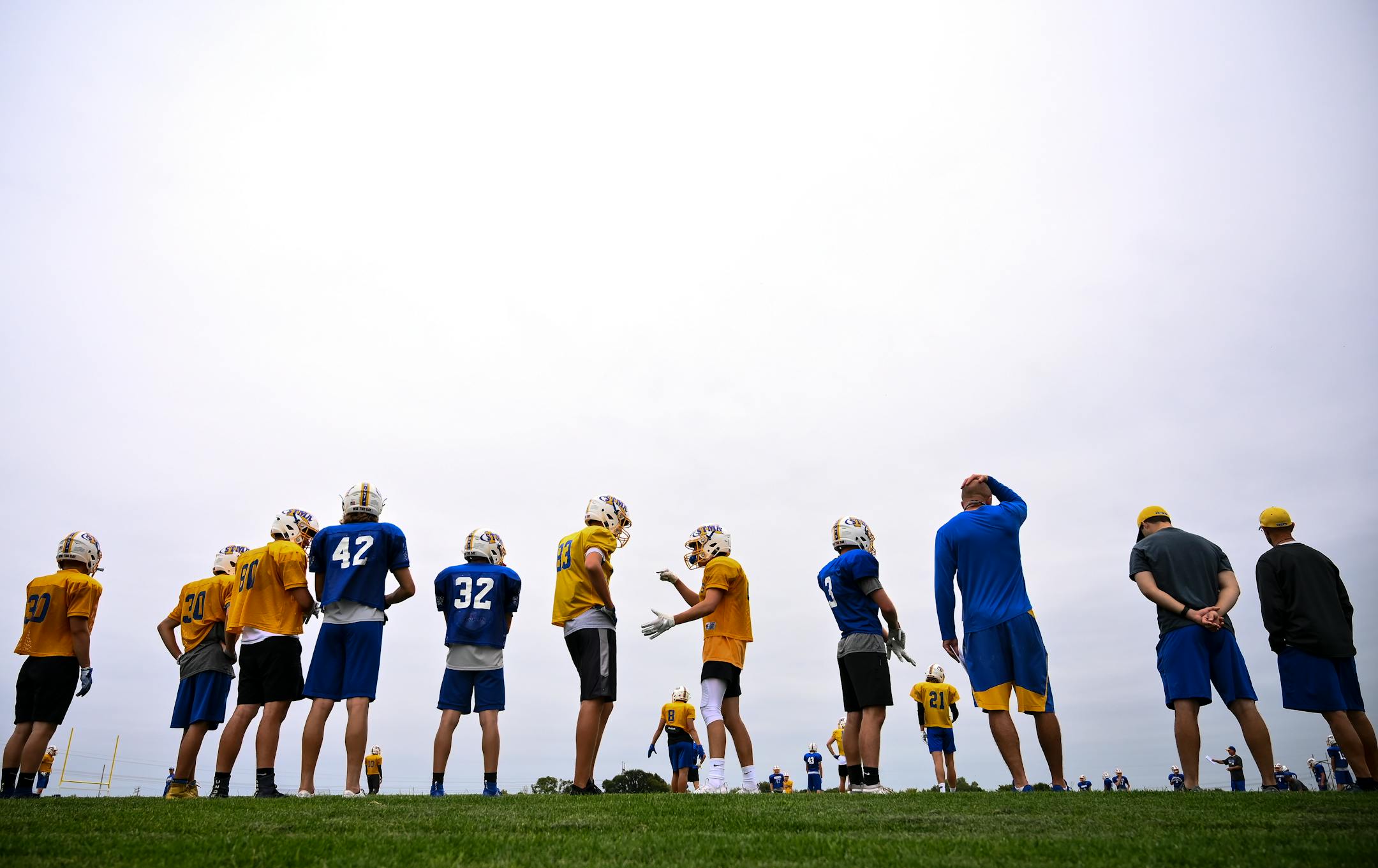 St. Michael-Albertville High School football players lined up along the sideline during practice Thursday. ] Aaron Lavinsky • aaron.lavinsky@startribune.com Football coaches believe the most improvement they see in their teams each year happens between weeks 1 and 2. We photograph practice Thursday, Sept. 5, 2019 at St. Michael-Albertville High School in St. Michael, Minn.