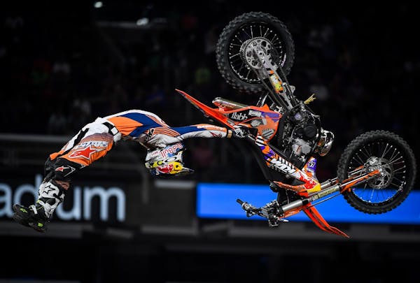 Levi Sherwood performed a superman seat-grab backflip during his first run in the motocross freestyle competition Friday night. Sherwood won the gold 