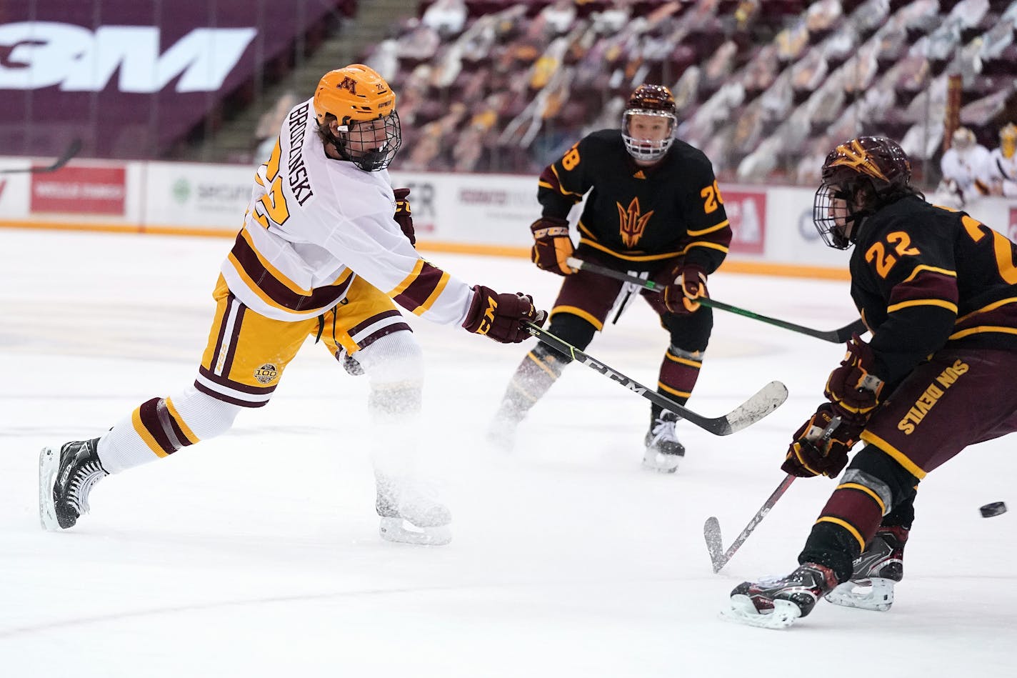 Gophers forward Bryce Brodzinski took a shot on goal as Arizona State defenseman Jack Judson defended Friday. The Gophers won in a rout, 10-2.