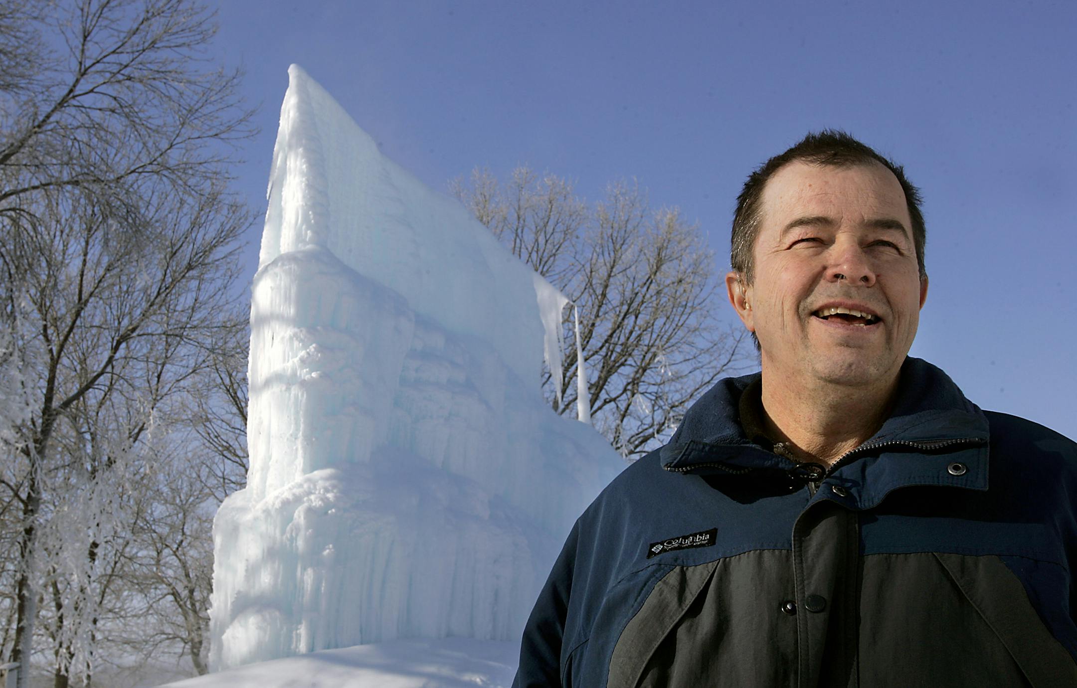 Roger Hanson, 59, built a 35-foot high ice sculpture in his Big Lake Township backyard. It is the second year the software developer has made the structure, which spans more than 100 feet and is made by a constant spray of water freezing on a steel frame. "There is a lot of science behind it," he said.