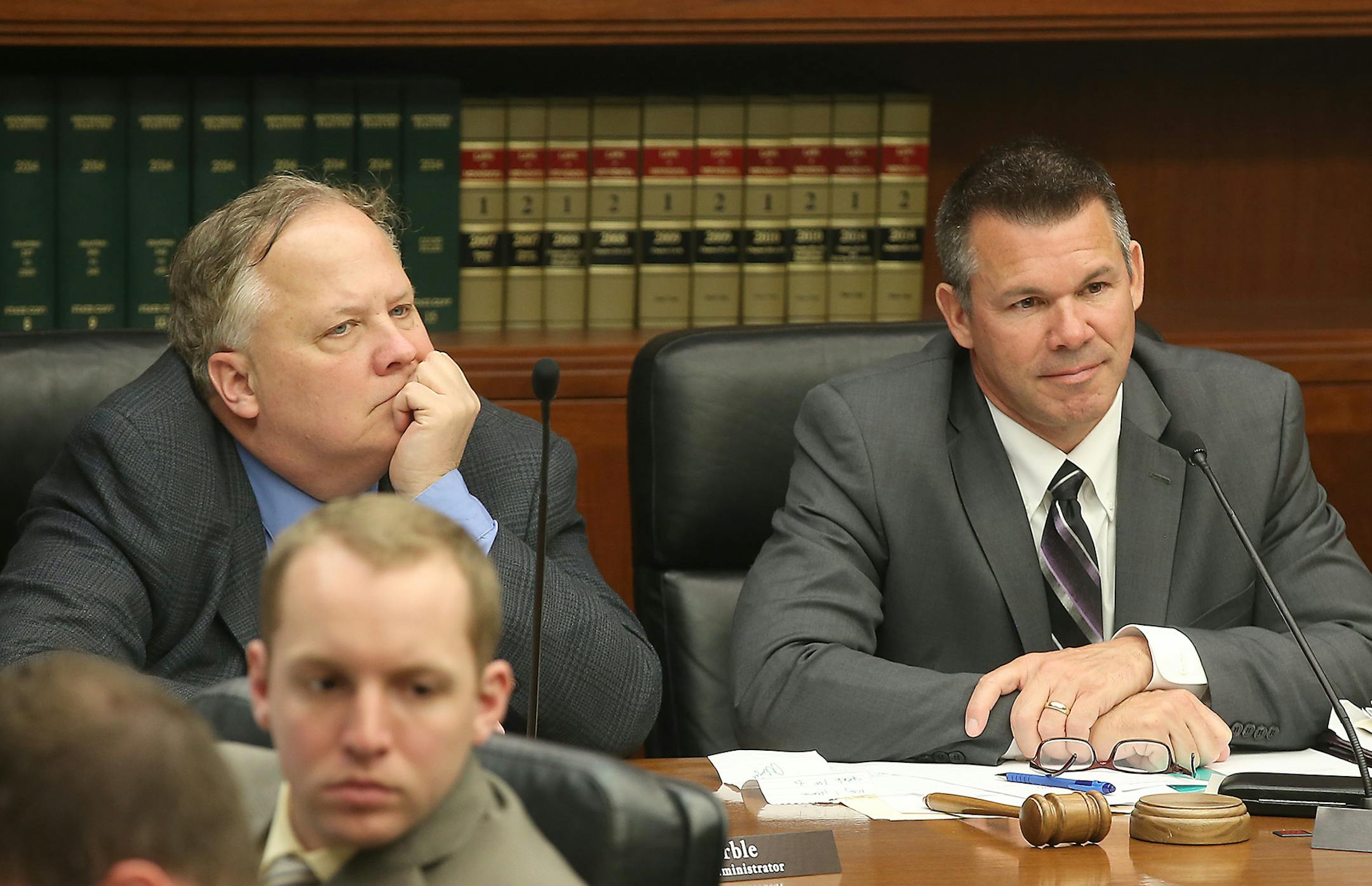 Joe Marble, left, and Tim Kelly of the Minnesota House transportation committee listened to supporters of the license bill Wednesday, March 25, 2015 in the State Office Building in St. Paul, MN. ] (ELIZABETH FLORES/STAR TRIBUNE) ELIZABETH FLORES • eflores@startribune.com
