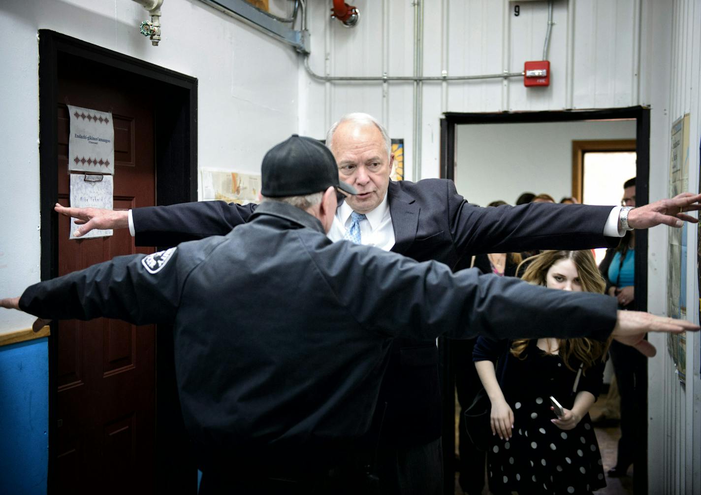 School safety and security officer John Parameter showed Rep John Kline how narrow the makeshift hallways are in a building that was once used for a vocational auto body shop and never intended to be used as classroom space. The building has a leaky roof, poor insulation and an overburdened electrical system. ] GLEN STUBBE * gstubbe@startribune.com Wednesday, April 8, 2015 Rep. John Kline and Rep. Rick Nolan visited the Bug-O-Nay-Ge-Shig school run by the Leech Lake Band of Ojibwe to try to drum