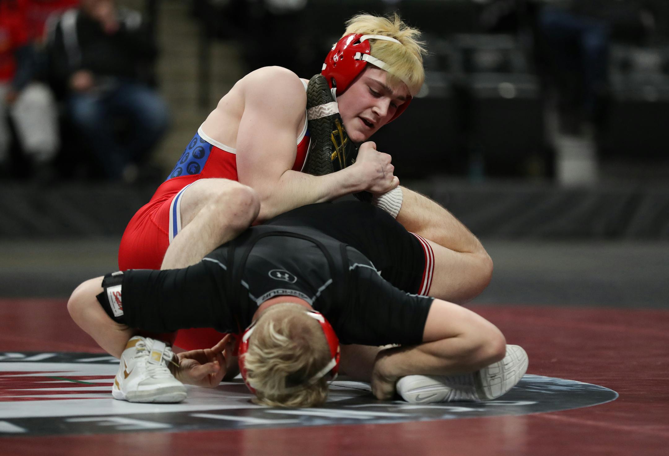 Ryan Sokol of Simley held onto the leg of Charlie Pickell of Mankato West in their Class 2A 132-pound match, which Sokol won, in the 2019 wrestling state meet. Sokol is back to wrestle again in this year's meet. Photo: Shari L. Gross • shari.gross@startribune.com
