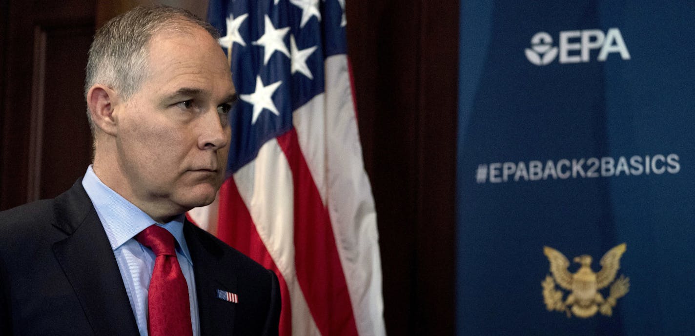 FILE - In this Tuesday, April 3, 2018, file photo, Environmental Protection Agency Administrator Scott Pruitt attends a news conference at the EPA in Washington, on his decision to scrap Obama administration fuel standards. The fossil-fuels lobbyist tied to the bargain-priced Capitol Hill condo leased by Pruitt is taking early retirement as a result of the scandal. (AP Photo/Andrew Harnik, File)