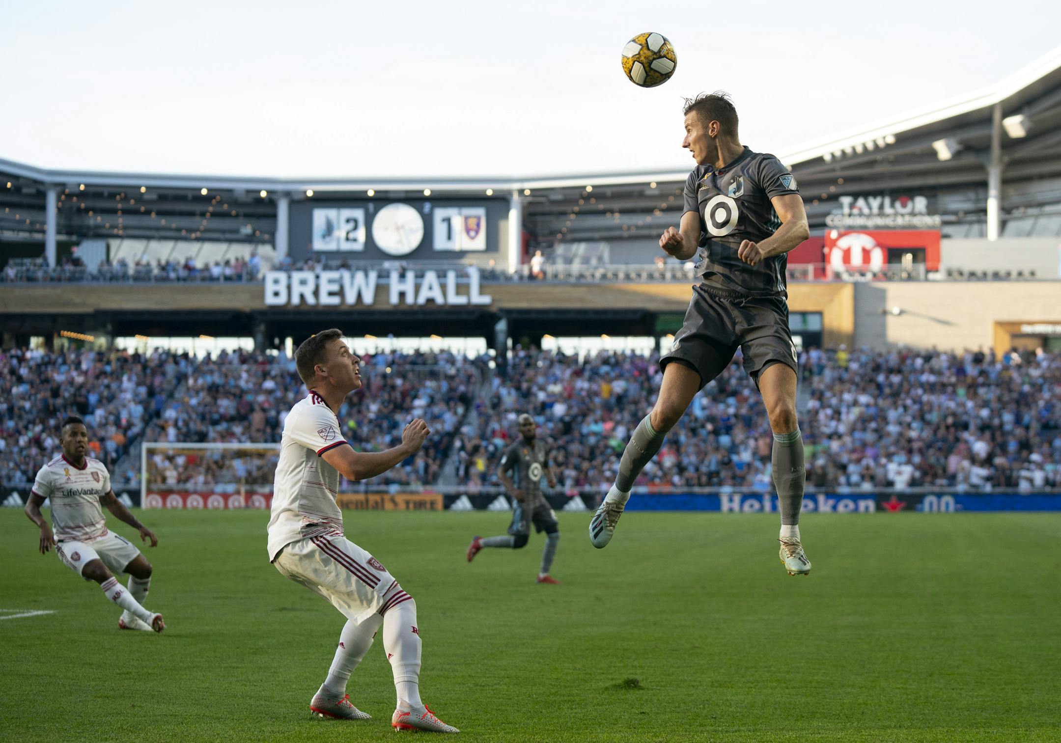 Minnesota United midfielder Jan Gregus (8) headed the ball towards a teammate over Real Salt Lake forward Corey Baird (17) in the second half. ] JEFF WHEELER • jeff.wheeler@startribune.com Minnesota United defeated Real Salt Lake 3-1 in an MLS soccer game Sunday afternoon, September 15, 2019 at Allianz Field in St. Paul.