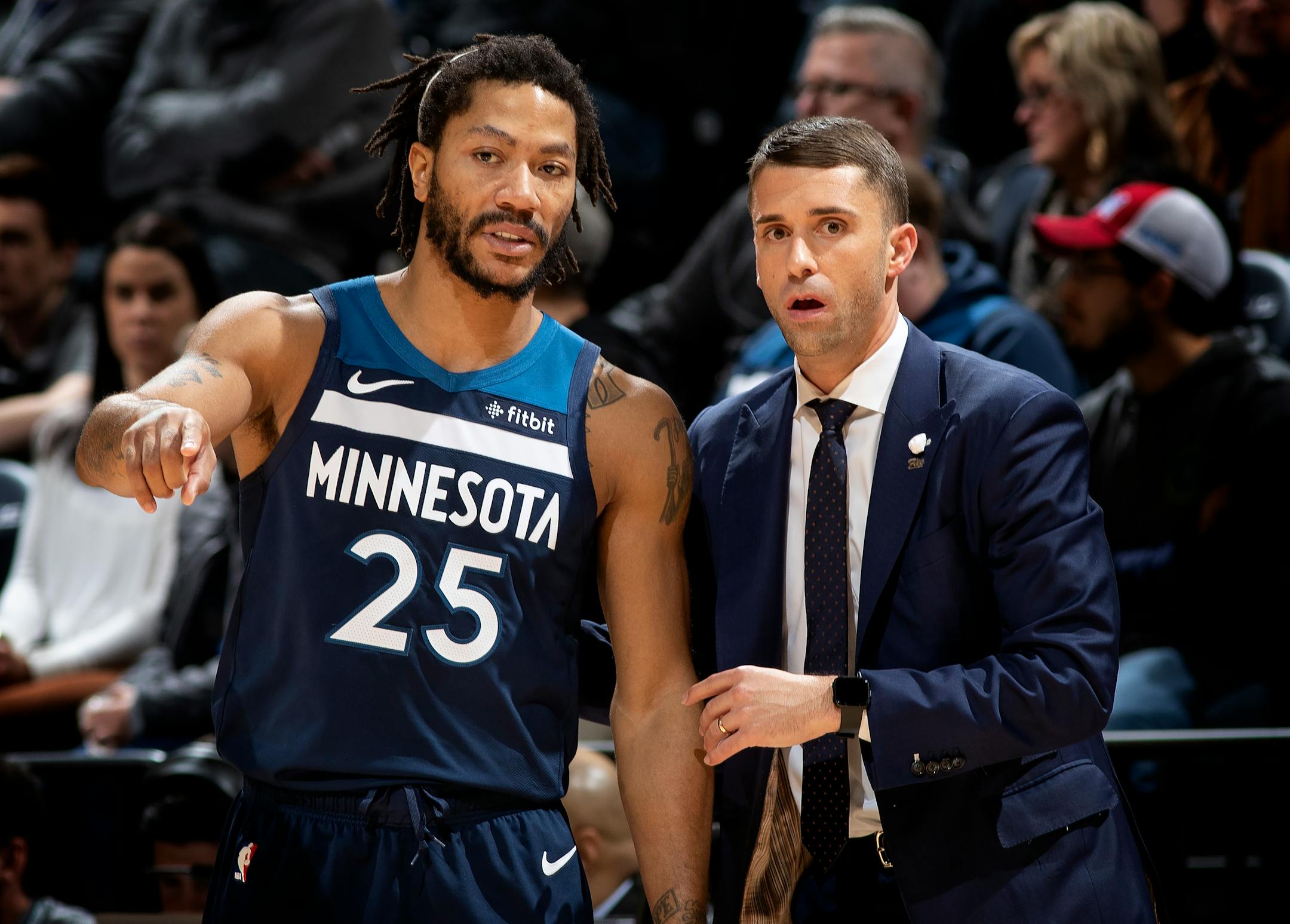 Derrick Rose spoke with Timberwolves interim head coach Ryan Saunders in the second quarter Sunday vs. Phoenix. Rose finished with 31 points, including the winning basket.