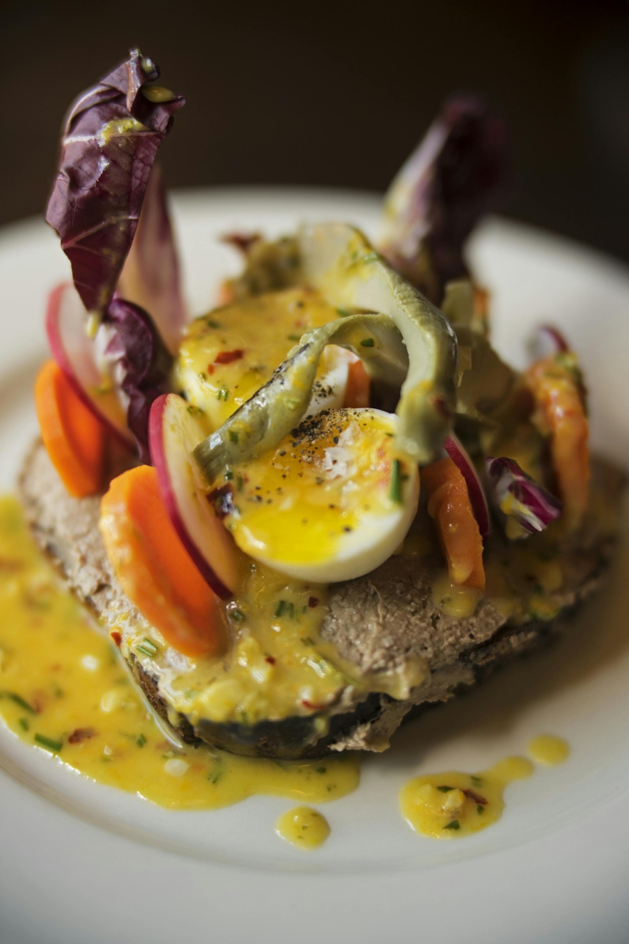 The chopped liver comes with anchovy butter, credit, and grilled rye.