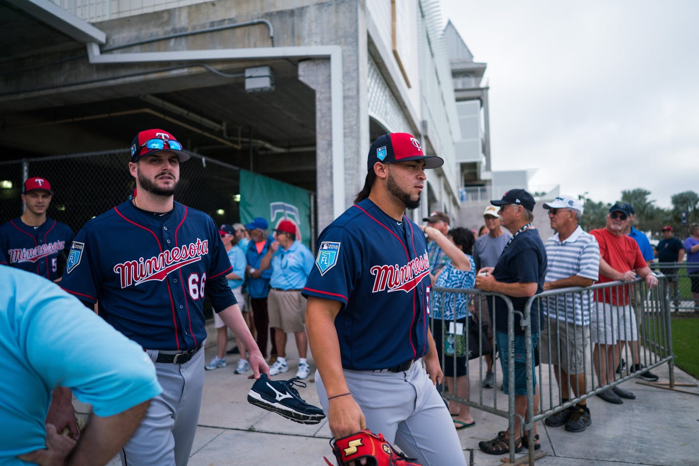 Twins pitchers Myles Jaye and Gabriel Moya walked out to their first day of workouts. ] MARK VANCLEAVE &#x2022; mark.vancleave@startribune.com * First day of pitcher and catcher workouts at Twins spring training in Fort Myers, Florida on Wednesday, Feb. 14, 2018.