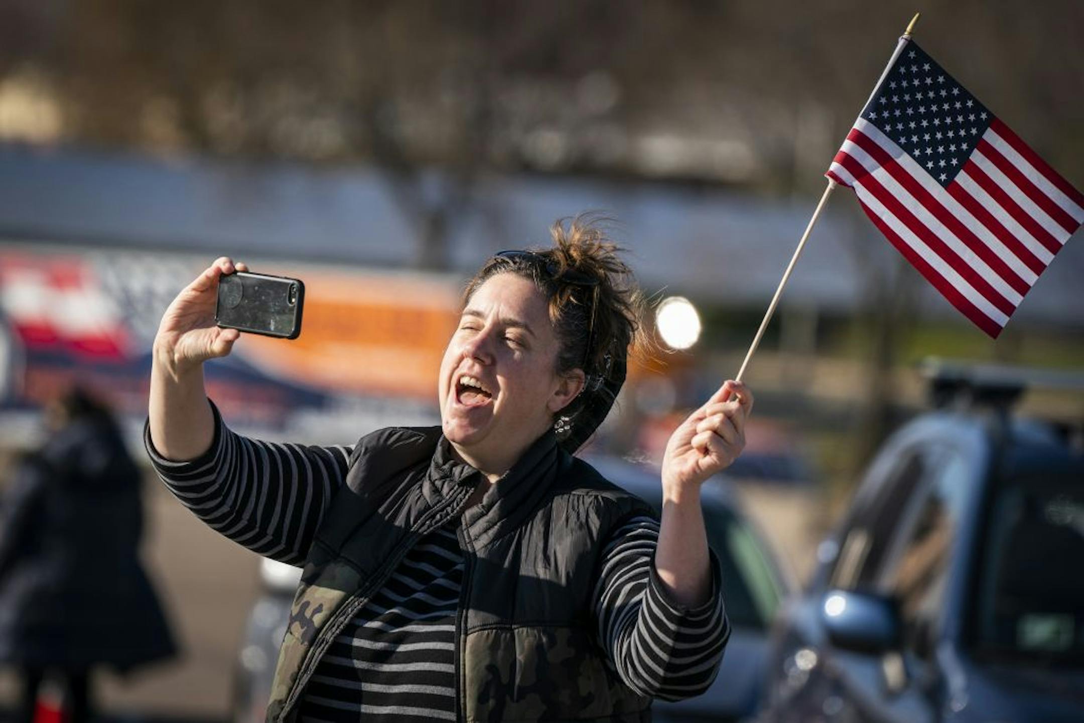 Danielle Barr of Richfield danced before former Vice President Joe Biden spoke during a drive-in campaign event in Falcon Heights.