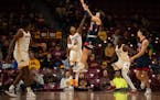 Caleb Williams (32) torched the Gophers for 41 points last year in an exhibition game at Williams Arena while playing for Macalester, now he's transfe