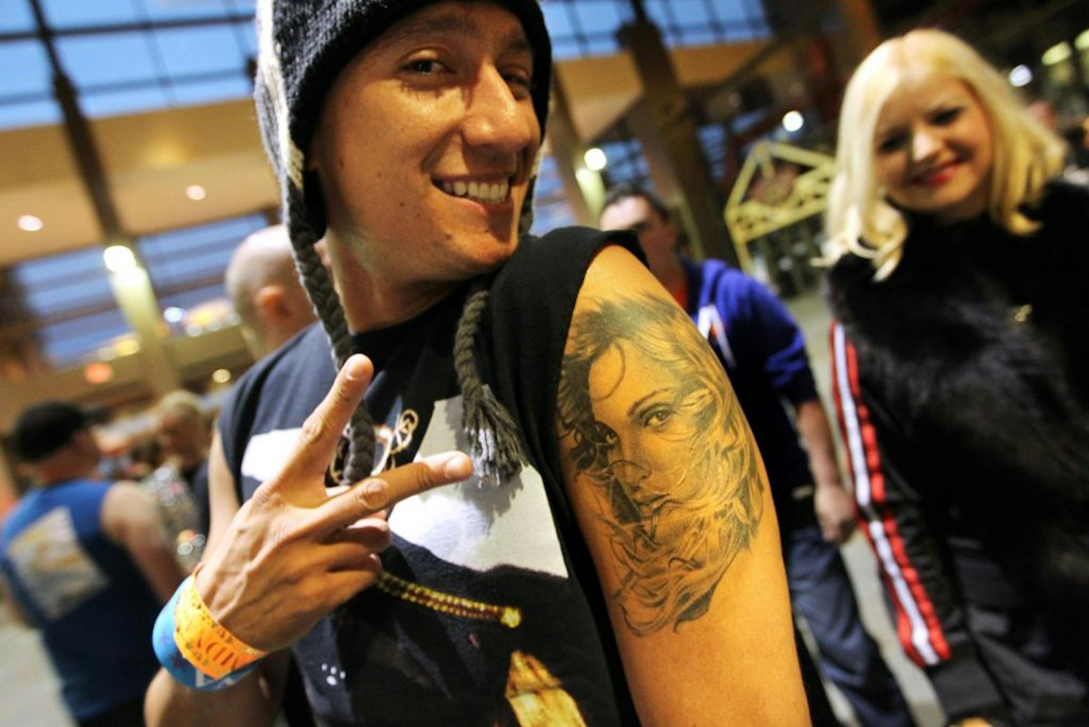 Luis Serrano of Phoenix, AZ, shows off his Madonna tattoo at the Madonna concert at Xcel Energy Center in St. Paul November 3, 2012.