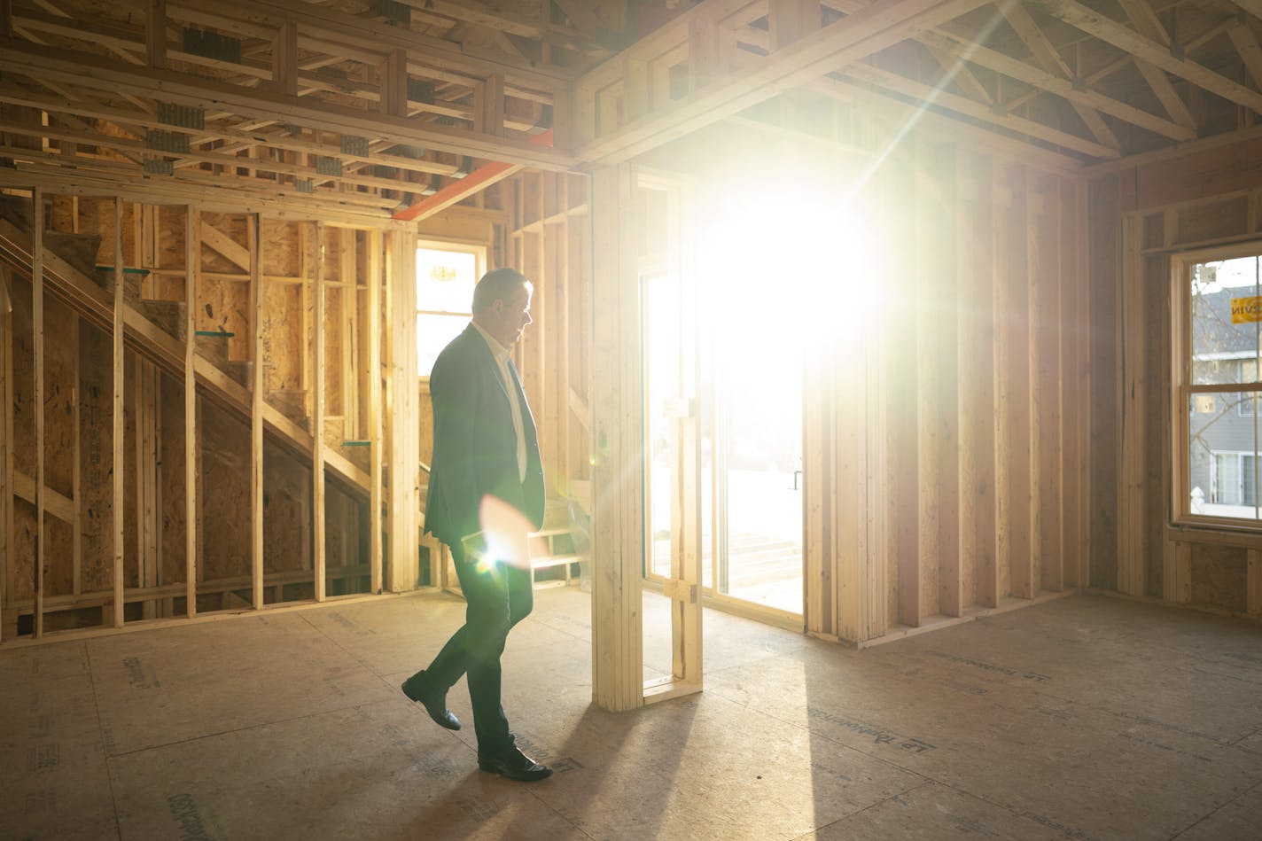 Realtor Jim Schwarz in one of the townhouses under construction in his Sheldon Place development in Eden Prairie. Despite the pandemic, Twin Cities housing construction permits continue to outpace last year.