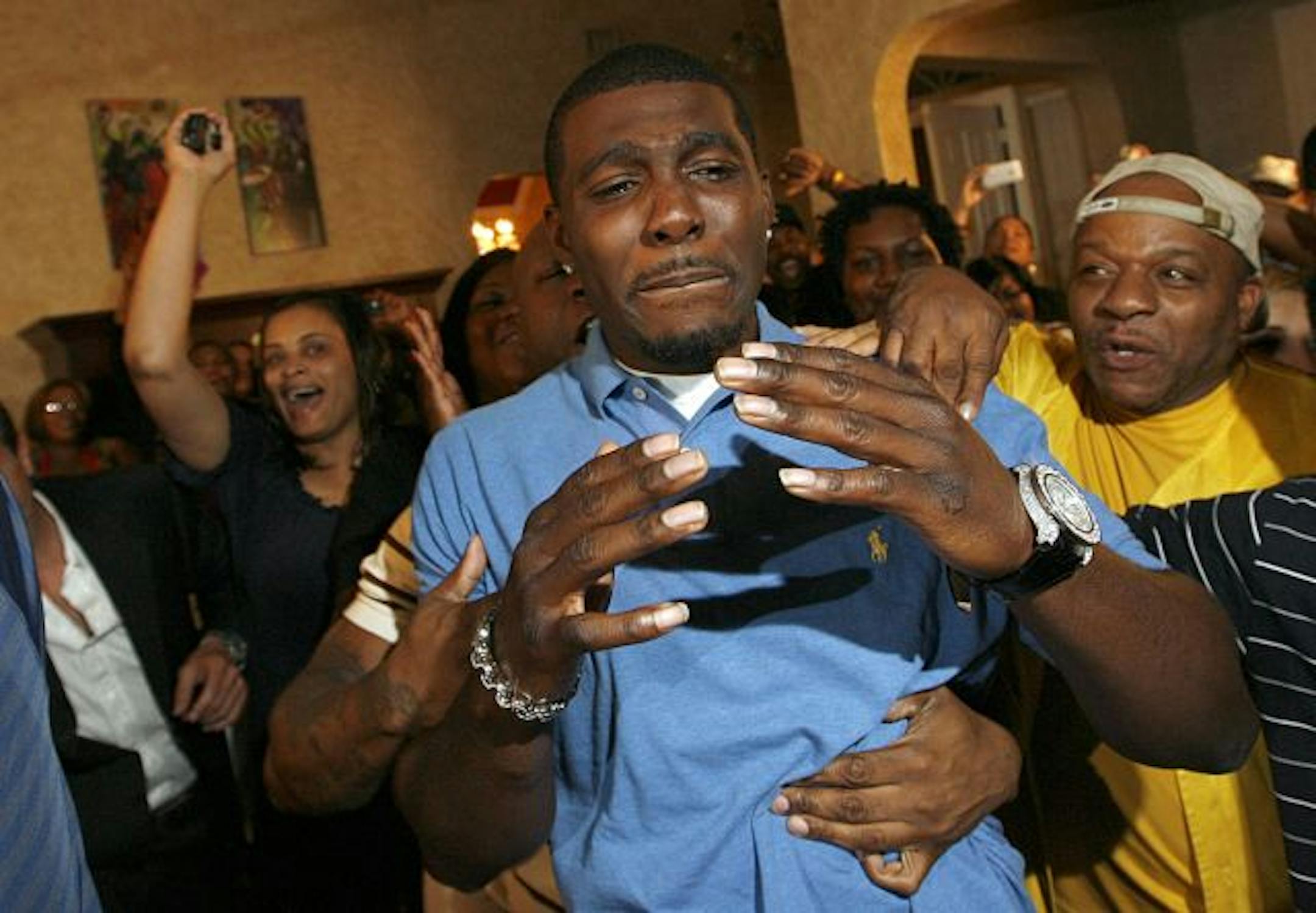 Oklahoma State wide receiver Dez Bryant was overcome with emotion with friends and family after being selected as the 24th overall pick by the Dallas Cowboys.