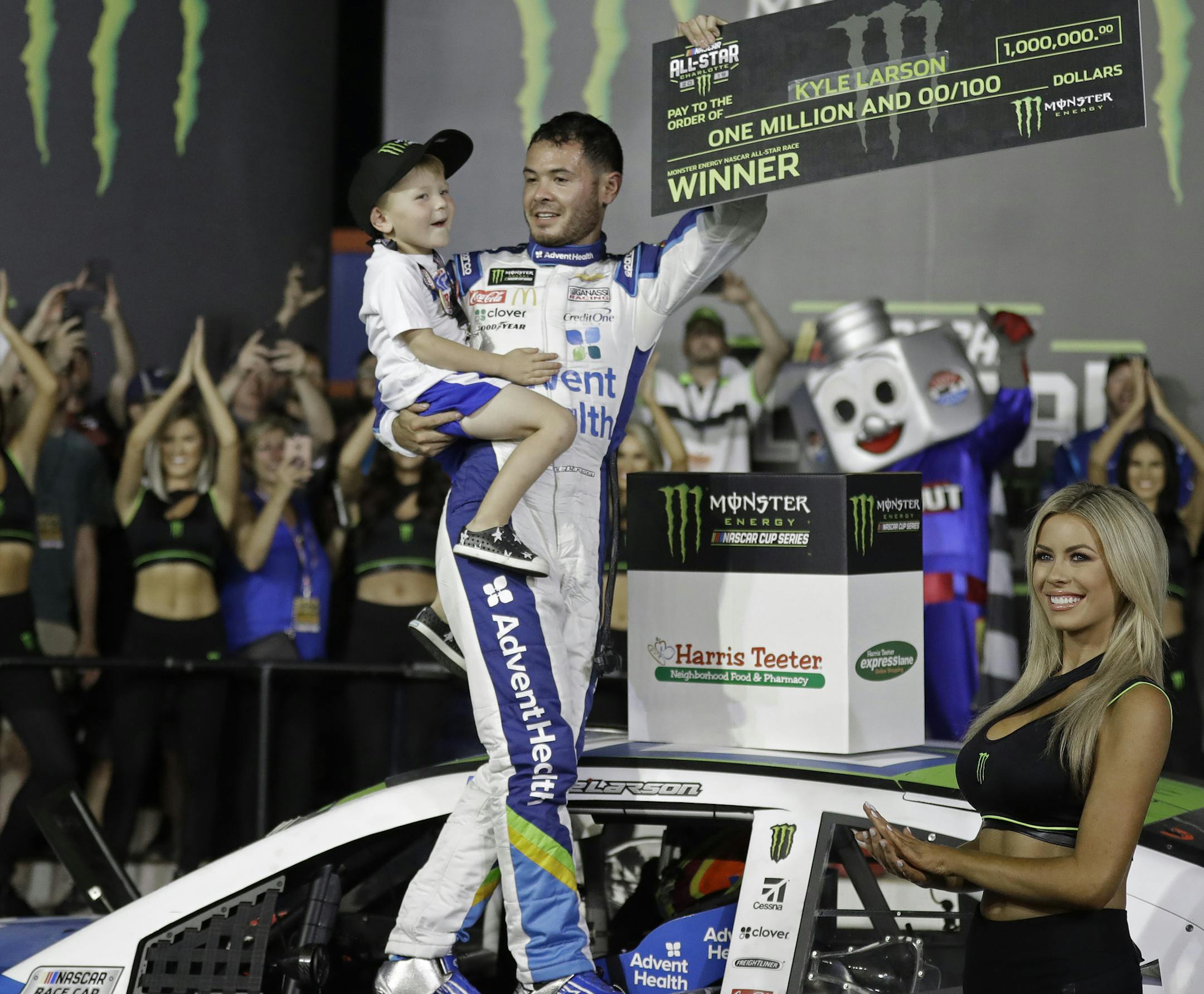 Kyle Larson celebrates in Victory Lane after winning the NASCAR All-Star Race at Charlotte Motor Speedway in Concord, N.C., Saturday, May 18, 2019. (AP Photo/Chuck Burton)