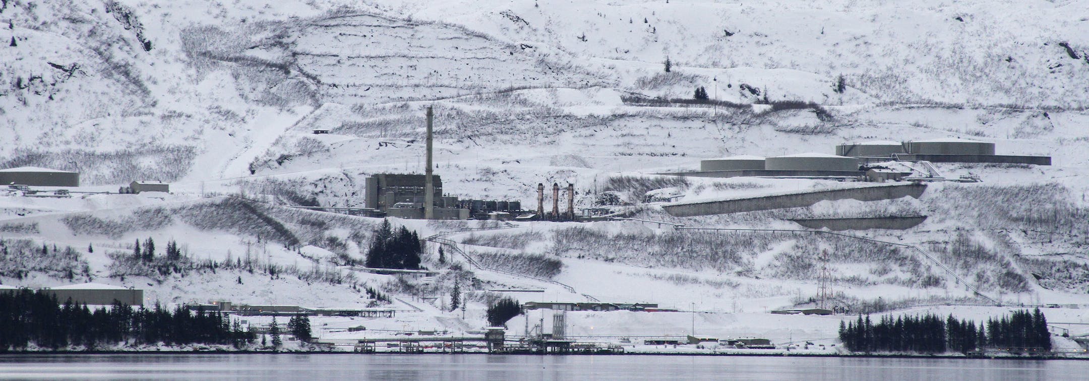 In this photo taken Feb. 26, 2014, is the terminus of the 800-mile trans-Alaska oil pipeline in Valdez, Alaska. The Exxon Valdez loaded up at the terminus and then ran aground near Bligh Reef in March 1989, spilling nearly 11 million gallons of crude in Prince William Sound. (AP Photo/Mark Thiessen)