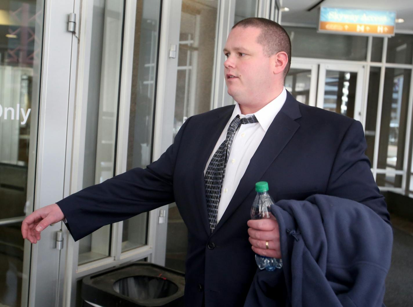 Former Minneapolis police officer Christopher Reiter, 36, arrived at court with his attorney Robert Fowler, not pictured, Thursday, March16, 2017, at the Hennepin County Jail in Minneapolis.