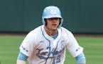 North Carolina's Aaron Sabato (19) rounds second base against Auburn during Game 1 at the NCAA college baseball super regional tournament in Chapel Hi