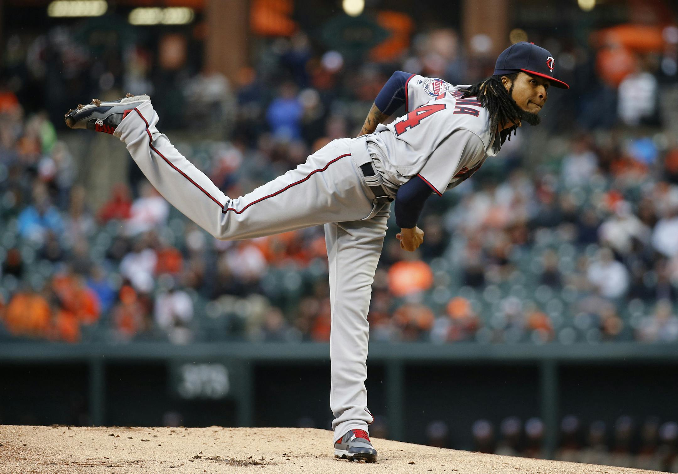Minnesota Twins starting pitcher Ervin Santana follows through on a pitch to the Baltimore Orioles in the first inning of an opening day baseball game in Baltimore, Monday, April 4, 2016. (AP Photo/Patrick Semansky)