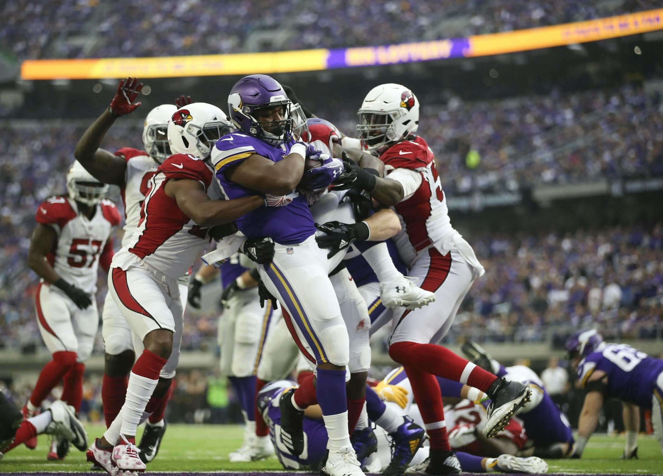 Minnesota Vikings fullback C.J. Ham (30) after gaining a yard on a