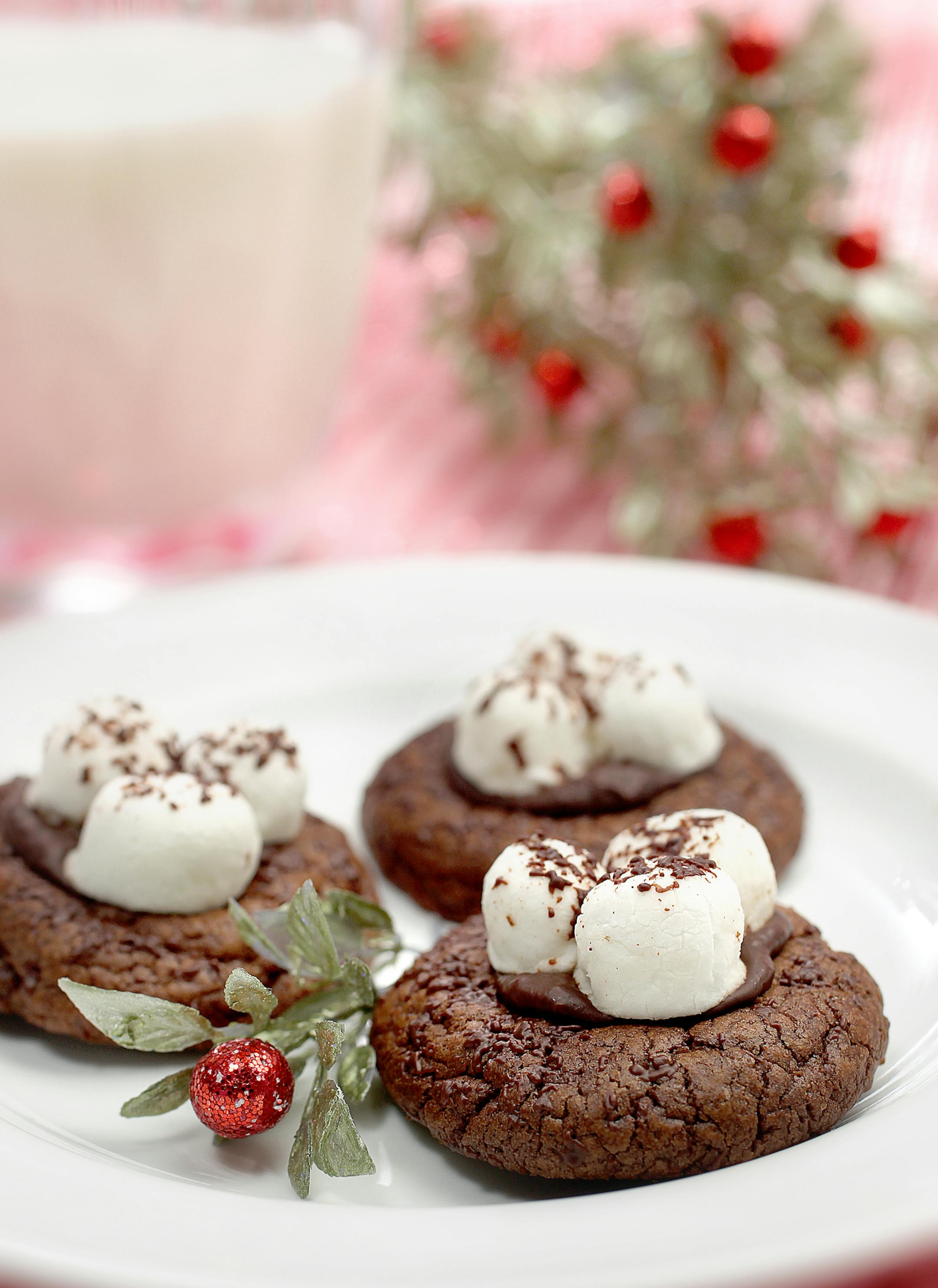 In this photo: Hot Cocoa Cookies [ 2013 winners in Taste holiday cookie contest: Winner:§ Cappuccino Flat Finalists: §Candy Cane Sugar Cookies, Cinnamon Bun Cookies, Orange-Almond Melting Moments, Hot Cocoa Cookies Photos by Tom Wallace, styled by Lee Dean October 29, 2013