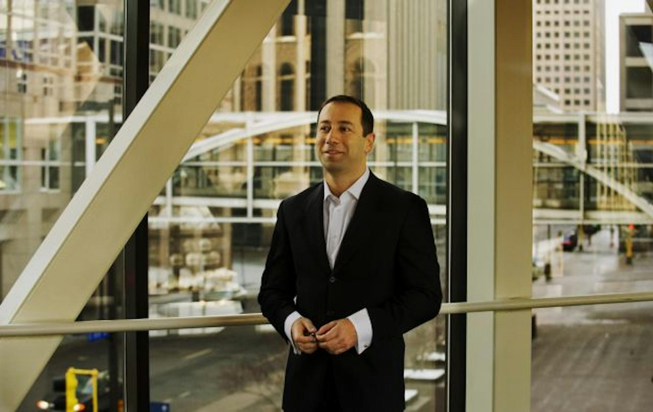CEO of Augusoft, Cem Erdem, on a downtown Minneapolis skyway.