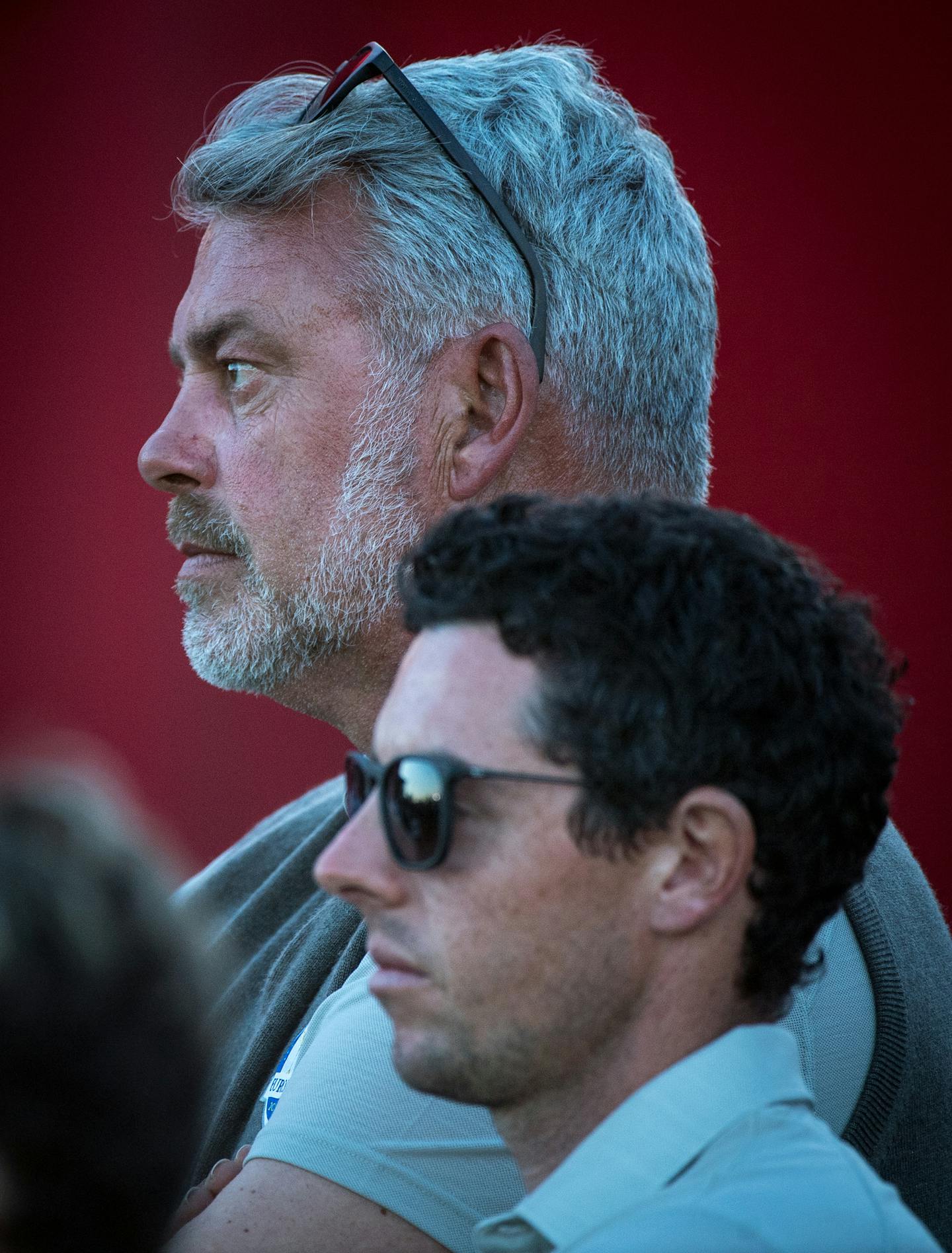 Europe Captain Darren Clarke and golfer Rory McIlroy watched the final moments of group three's match on a video board Saturday evening from near the green of the 18th hole. ] (AARON LAVINSKY/STAR TRIBUNE) aaron.lavinsky@startribune.com The Ryder Cup was held on Saturday, October 1, 2016 at Hazeltine National Golf Club in Chaska, Minn.