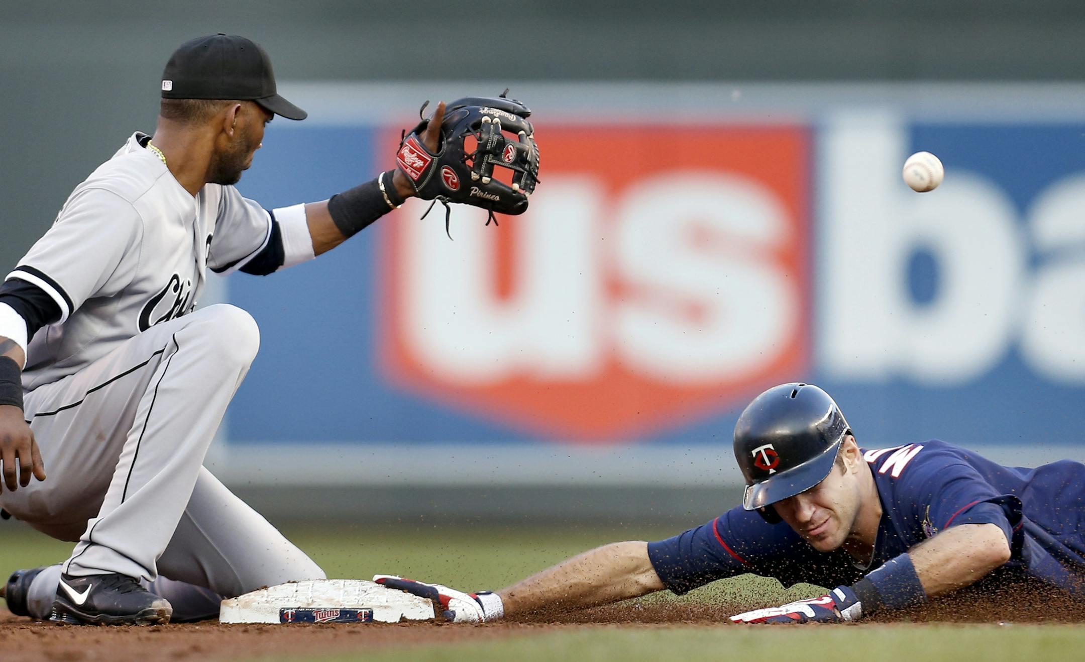 Joe Mauer slid safely ahead of the ball and a tag from Alexei Ramirez for a double in the second inning.