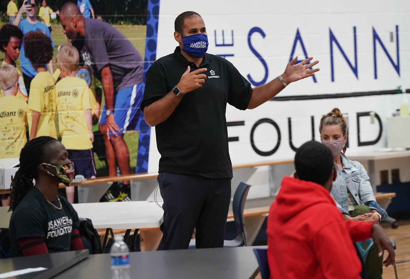 Tony Sanneh spoke to Dreamline mentors during a training session inside The Sanneh Foundation headquarters. ] Shari L. Gross • shari.gross@startribune.com The Sanneh Foundation is building an $11 million seasonal dome and new athletic fields to promote year-round physical activity in St. Paul. The nonprofit has retooled during the pandemic to offer more free meals for families in need and a tutoring center for students to go to if they are in distance-only learning and can't stay home.