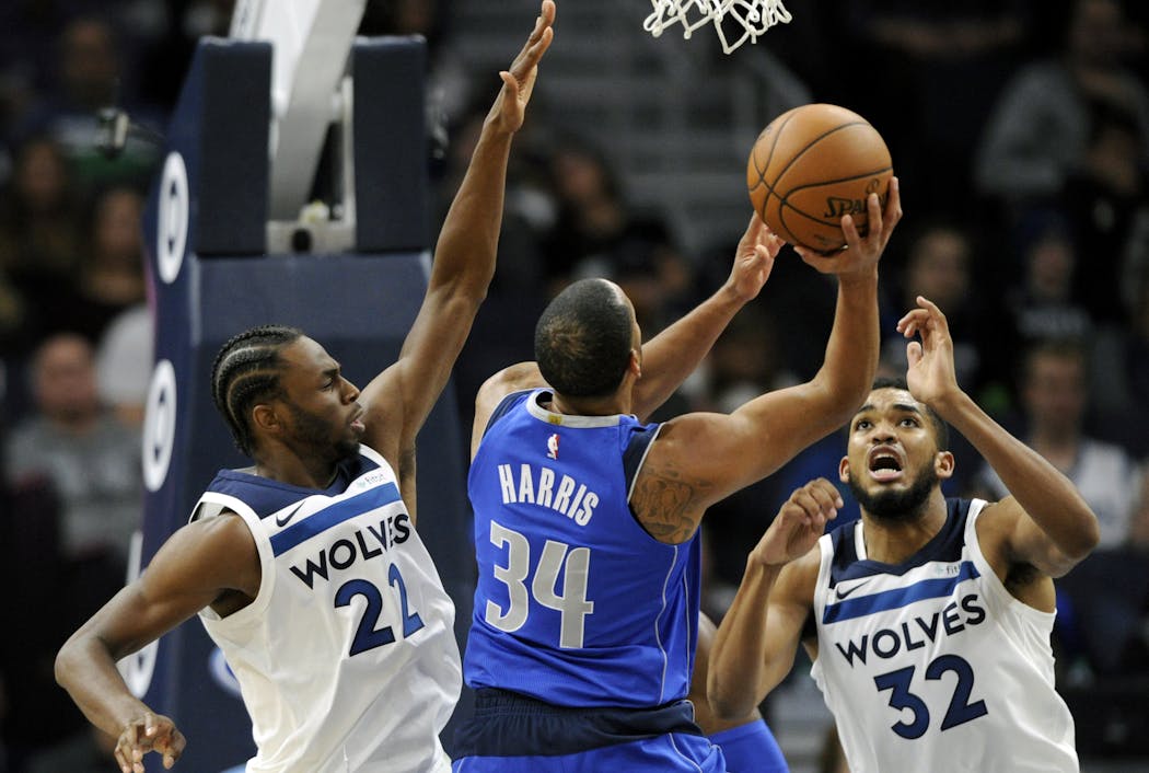 Timberwolves forward Andrew Wiggins (22) and center Karl-Anthony Towns (32)