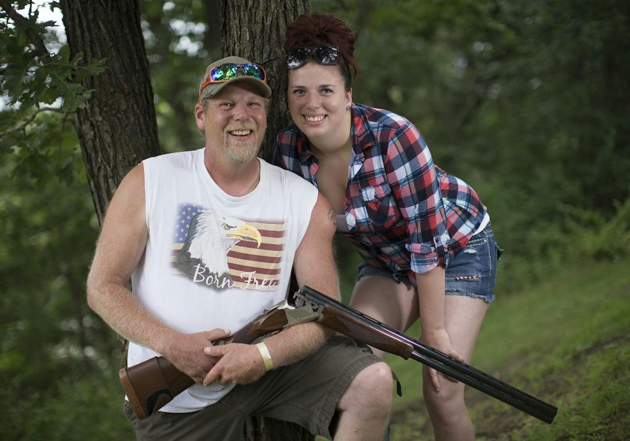 James Schaetzel and daughter Ashley, White Bear Lake   The 2015 Gamefair has developed from one big circus tent to a mini State fair atmosphere over its 34 years. We photographed a slice of the fair through the people that have attending this year, some who have been all 34 years.  [ PHOTO BY TOM WALLACE ' tom.wallace2@comcast.net   owfair081415: Game Fair