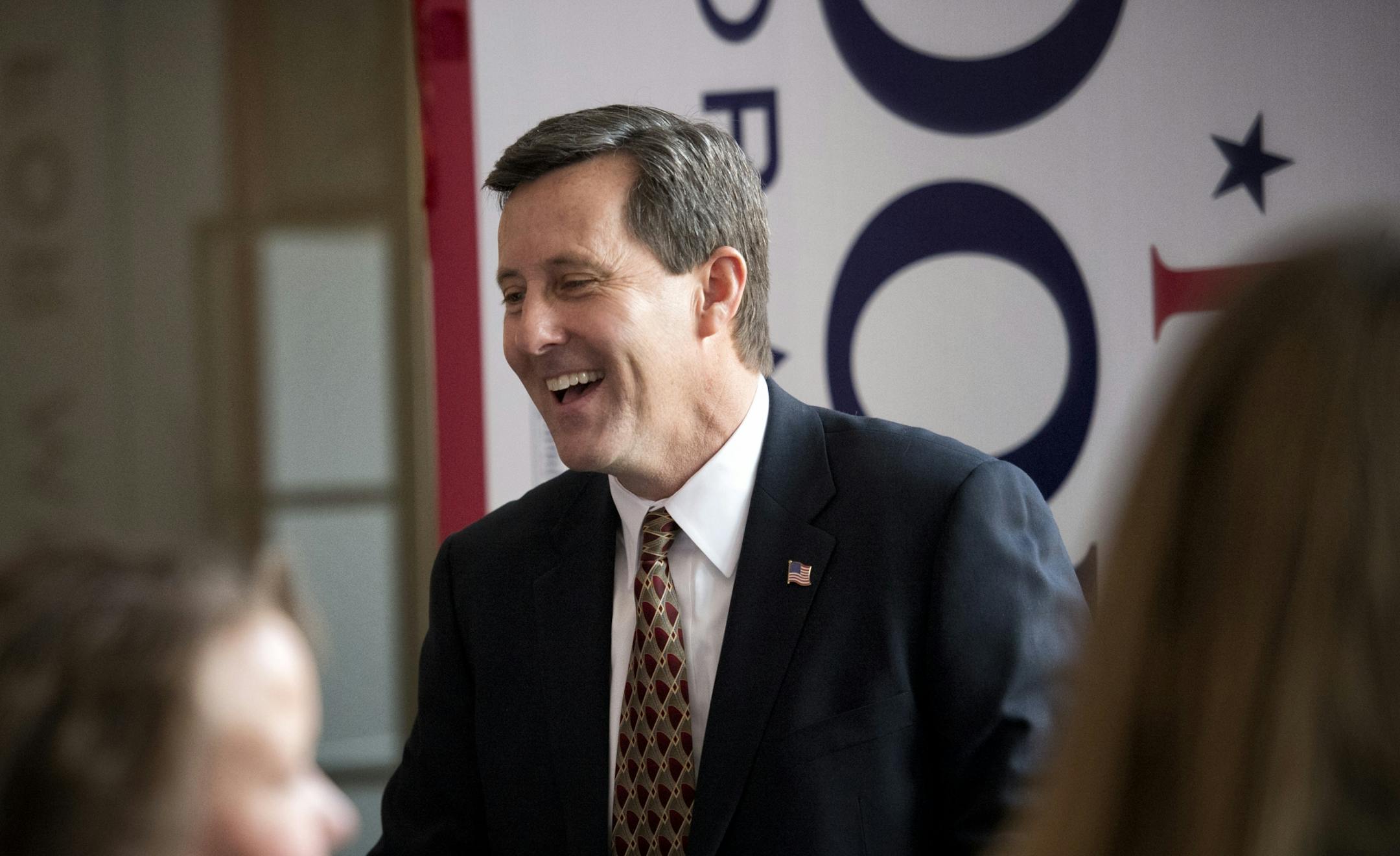 Keith Downey greets the crowd in the hallway at their central committee in Bloomington, Minn. on Saturday, April 6, 2013. While predicting a 2014 election cycle likely filled with candidate endorsement battles and probable Republican primaries, Downey said: "After that, we come together as Republicans and we go for the win in November." Downey, a consultant to state and local governments on operations and strategy who said he'd shift to full-time work for the party, represented Edina in the Minn