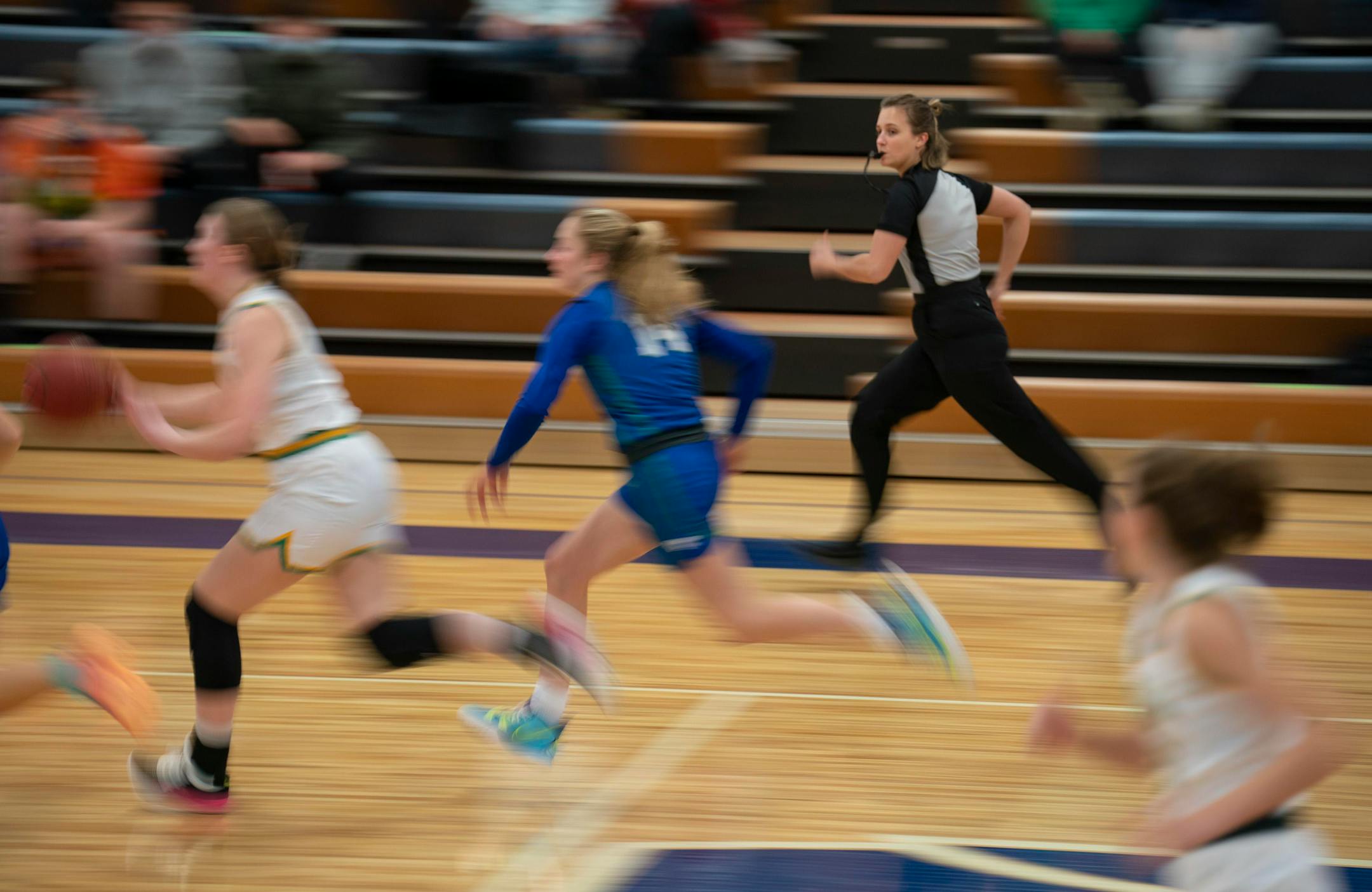 Leah Johnson kept pace with a fast break while officiating the first half of the Edina vs. Eagan girl's varsity game at Eagan High School Monday night, Jan. 10, 2022 in Eagan, Minn. An all-woman crew of Leah Johnson, Macy Madsen, and Dayna Rethlake officiated the basketball game between Edina and Eagan High Schools. ] JEFF WHEELER • Jeff.Wheeler@startribune.com