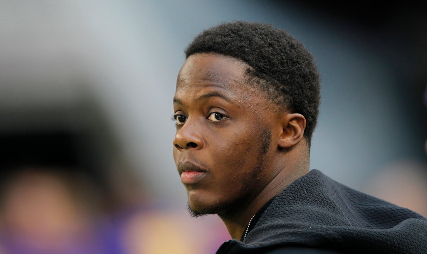 Injured Minnesota Vikings quarterback Teddy Bridgewater stands on the field before an NFL football game against the Chicago Bears Sunday, Jan. 1, 2017, in Minneapolis. (AP Photo/Andy Clayton-King)