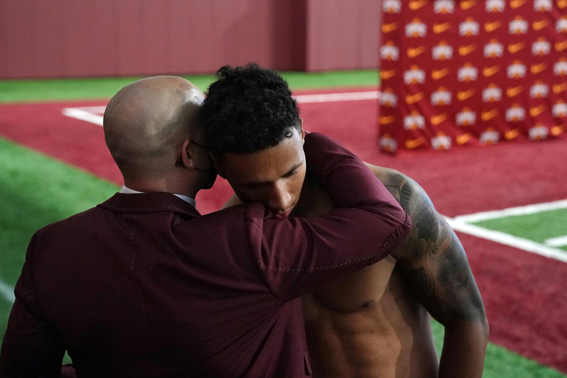 University of Minnesota head football coach P.J. Fleck gave a hug to cornerback Benjamin St-Juste during Pro Day.