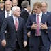Prince Harry talks with Sen. John McCain, R-Ariz., as they walk out of the Russell Senate Office Building on Capitol Hill, Washington, Thursday, May 9