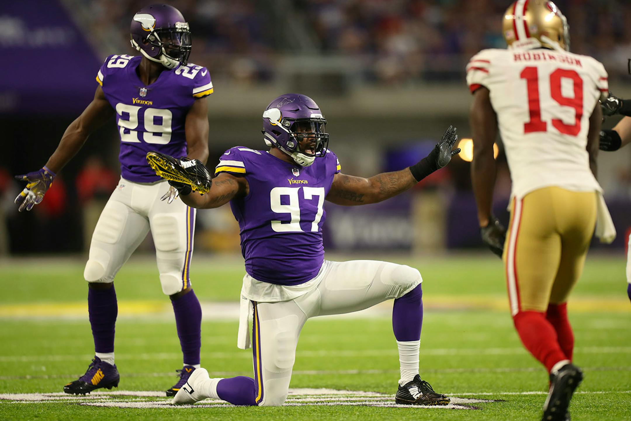 Minnesota Vikings defensive end Everson Griffen (97) appealed for a time out in the first quarter to put his shoe back on.