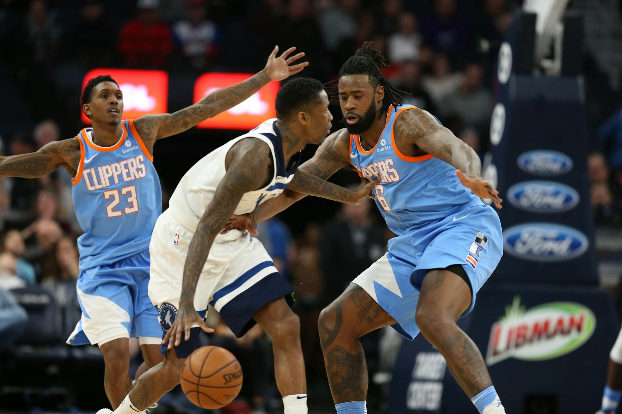 Minnesota Timberwolves guard Jamal Crawford (11) dribbled pass LA Clippers center DeAndre Jordan (6) at Target Center Tuesday March 20, 2018 in Minneapolis, MN.
