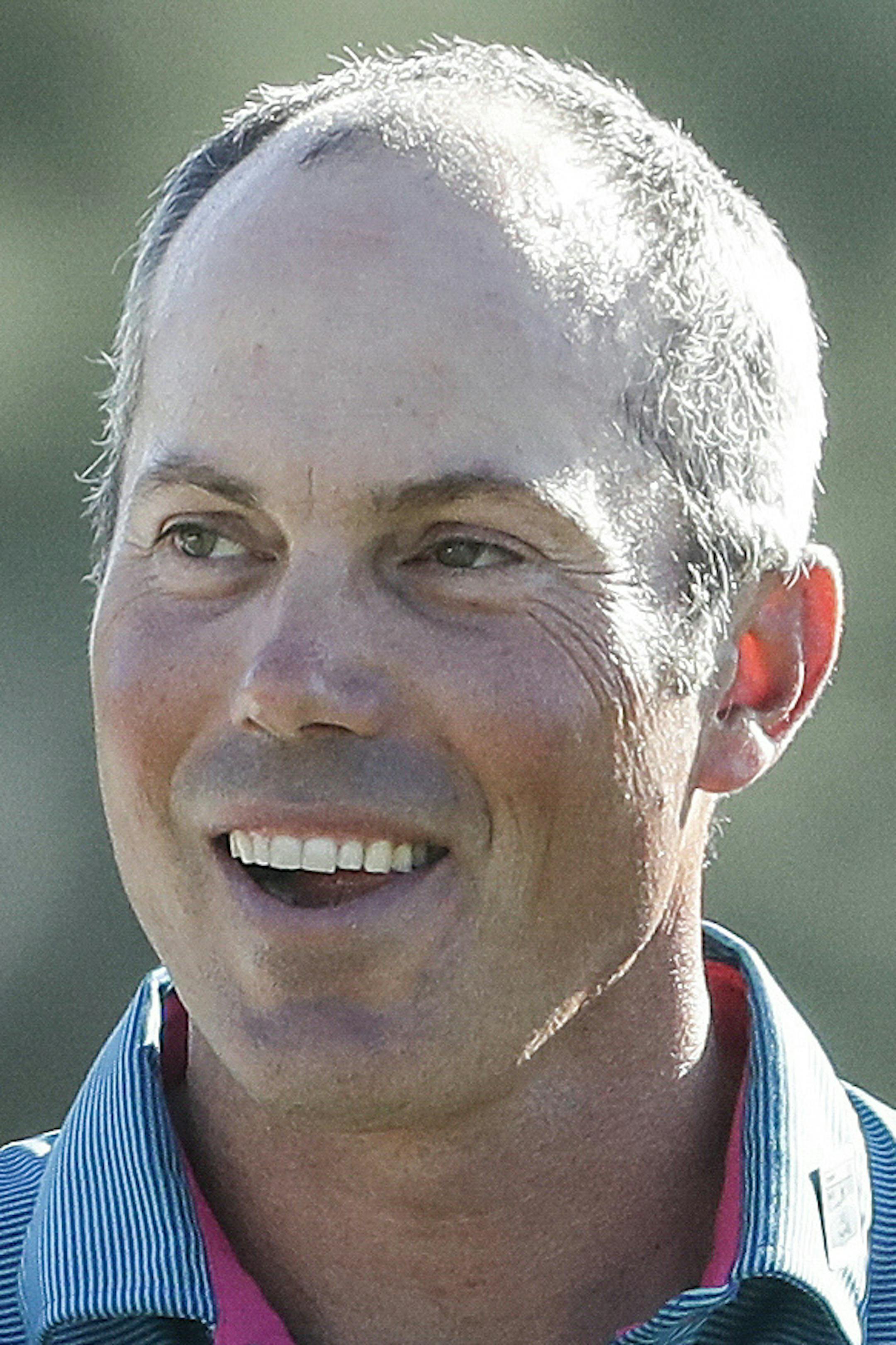 Matt Kuchar smiles as he walks off the 18th hole during the final round of the Masters golf tournament, Sunday, April 9, 2017, in Augusta, Ga. (AP Photo/Chris Carlson)