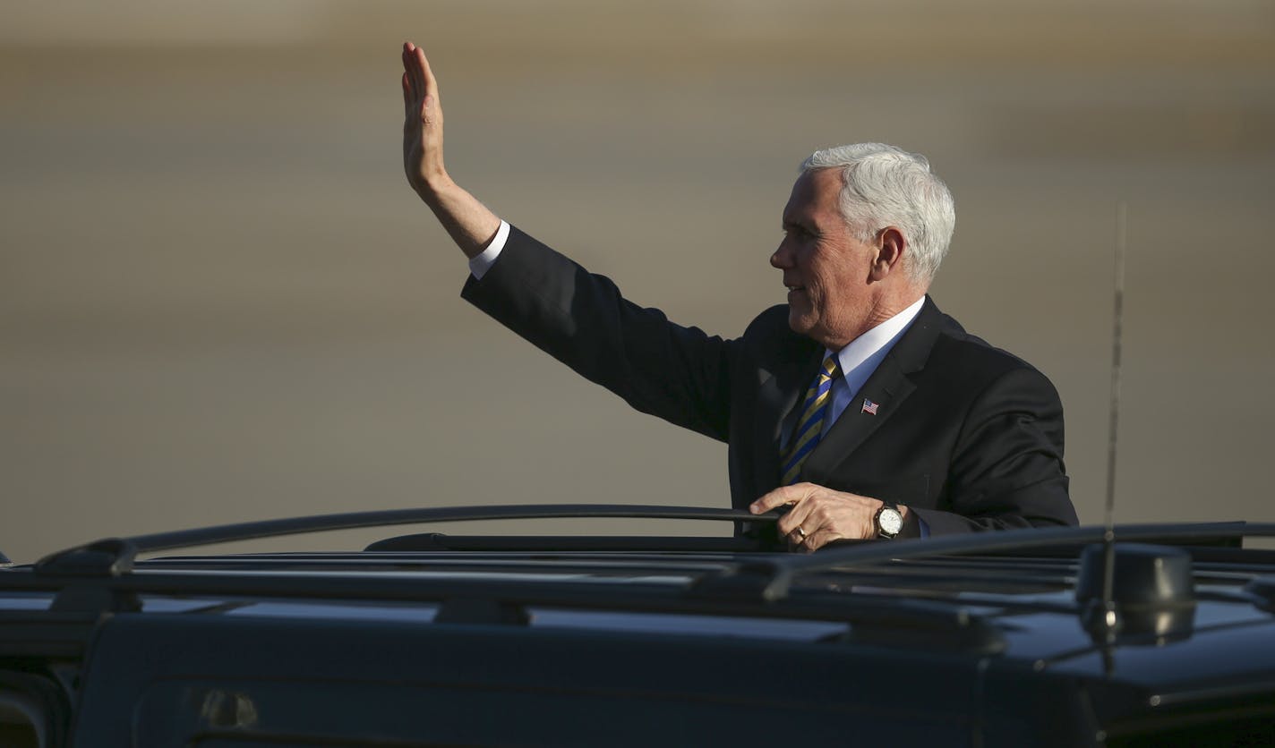 Vice President Mike Pence stood on the running board of his limo to wave goodbye to the supporters who welcomed him after his arrival at Minnesota National Guard &#xf1; 934th Airlift Wing. ] JEFF WHEELER &#xef; jeff.wheeler@startribune.com Vice President Mike Pence arrived in Minneapolis Tuesday evening, March 27, 2018 for a fundraiser tonight and an address he will give in the morning at an event called &#xec;Tax Cuts to Put America First,&#xee; at the Minneapolis Convention Center. He arrived