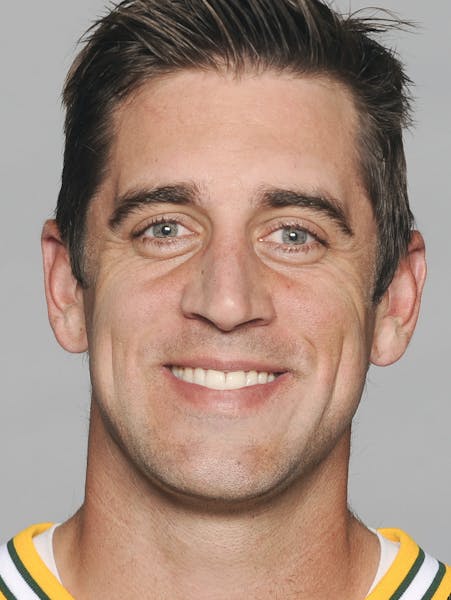 This is a 2014 photo of Aaron Rodgers of the Green Bay Packers NFL football team. This image reflects the Green Bay Packers active roster as of Monday