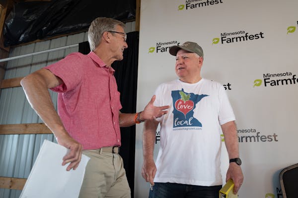 GOP candidate for governor Scott Jensen (left) and DFL Gov. Tim Walz, who debated for the first time at Farmfest, didn’t attract major opposition wi